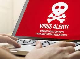 A laptop screen displaying a virus alert warning